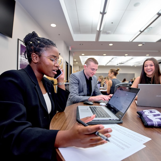 Student makes a cold call during practice session